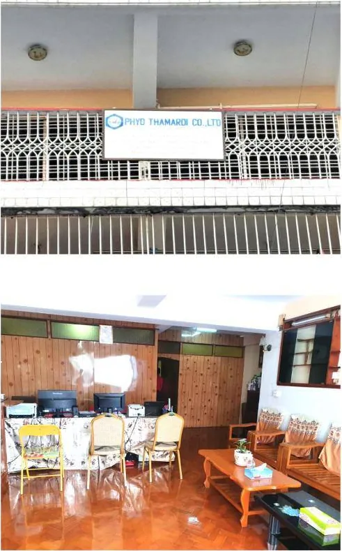 The company nameplate reading Phyo Thamardi Co., Ltd mounted on the balcony of the office building